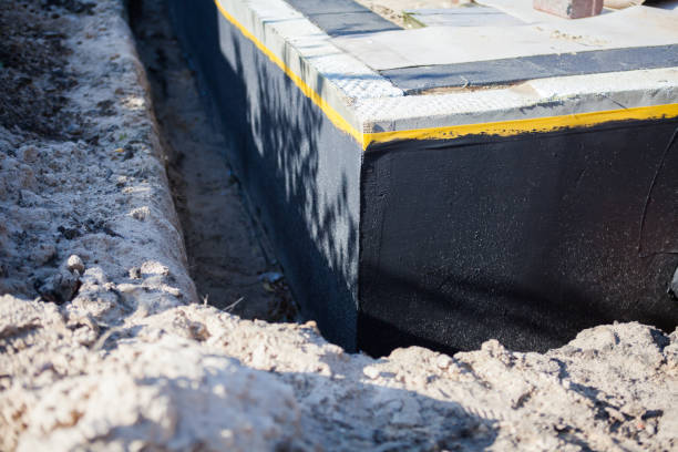 Professional Waterproofing technician working in Summit, WA